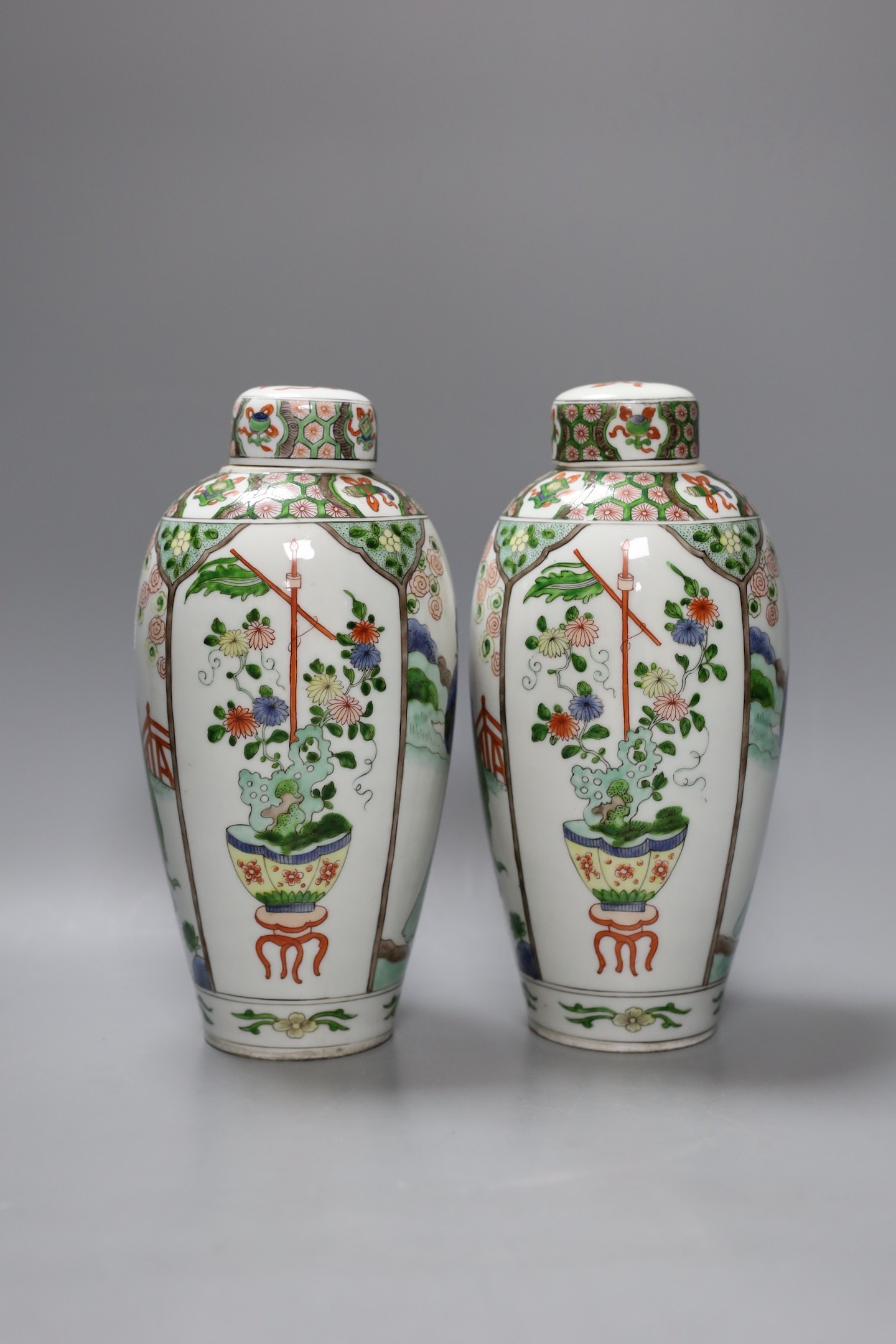 A pair of Sampson Chinese style famille verte vases with covers, 24cm tall